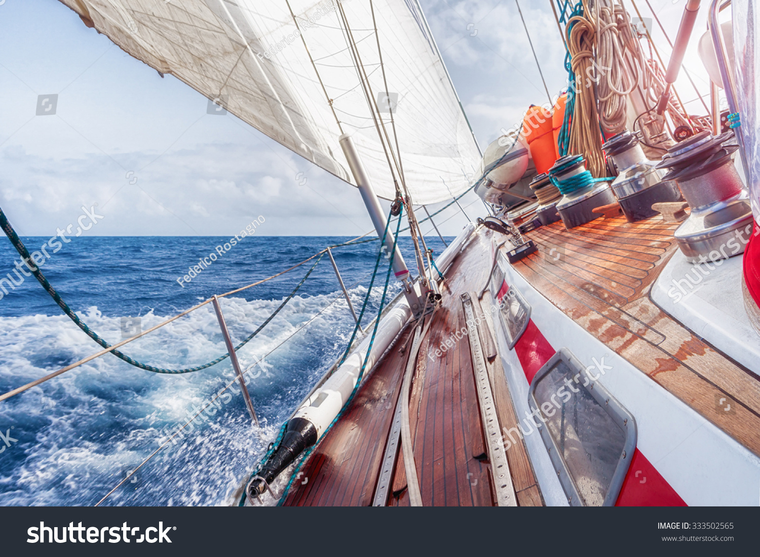 sail boat navigating on waves stock photo 333502565