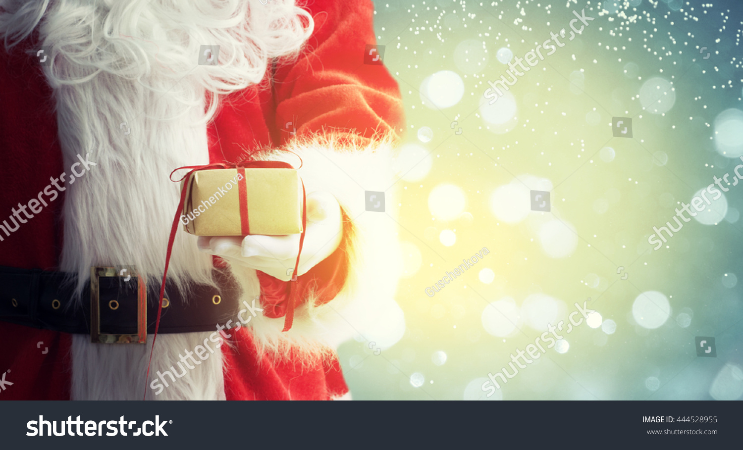 Santa Claus Gloved Hands Holding Giftbox Stock Photo (Edit Now) 444528955