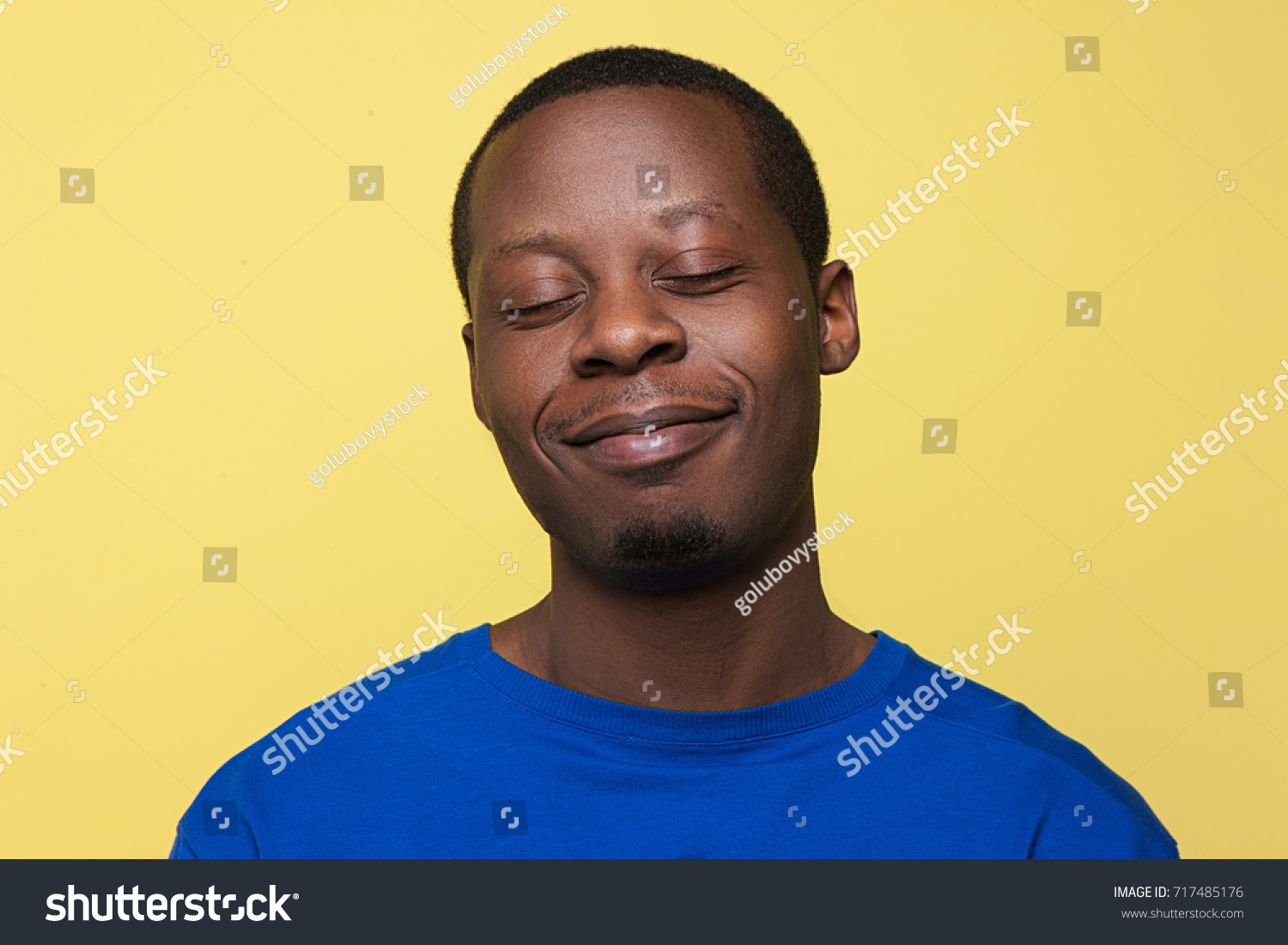 Satisfied Young Black Man Happy Mood Stock Photo (Edit Now) 717485176