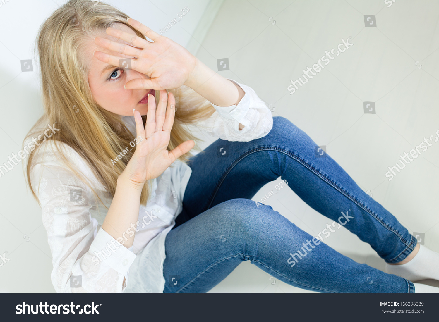 Scared Young Woman Holding Her Hands Up To Say Stop Stock Photo ...