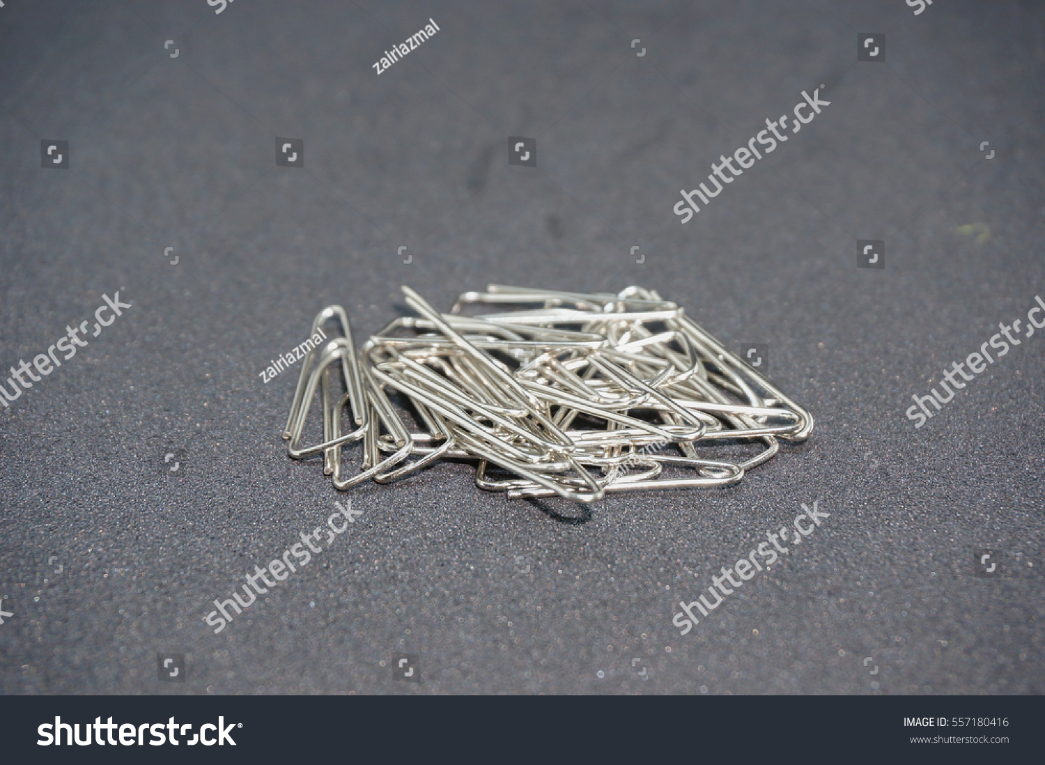 Scattered Paper Clips Isolated On Black Stock Photo 557180416 ...