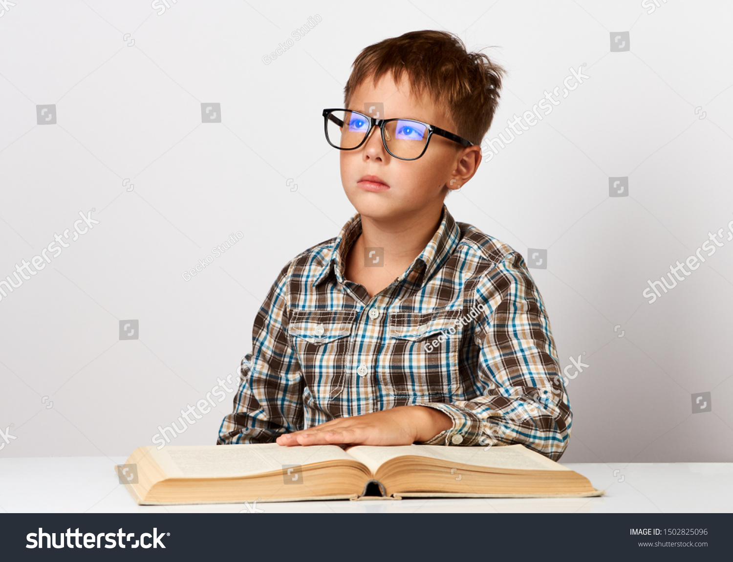 School Boy Reading Book White Background Stock Photo (Edit Now) 1502825096