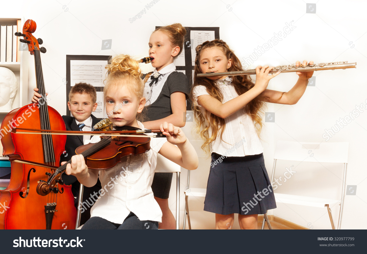 School Children Playing Musical Instruments Together Stock Photo ...