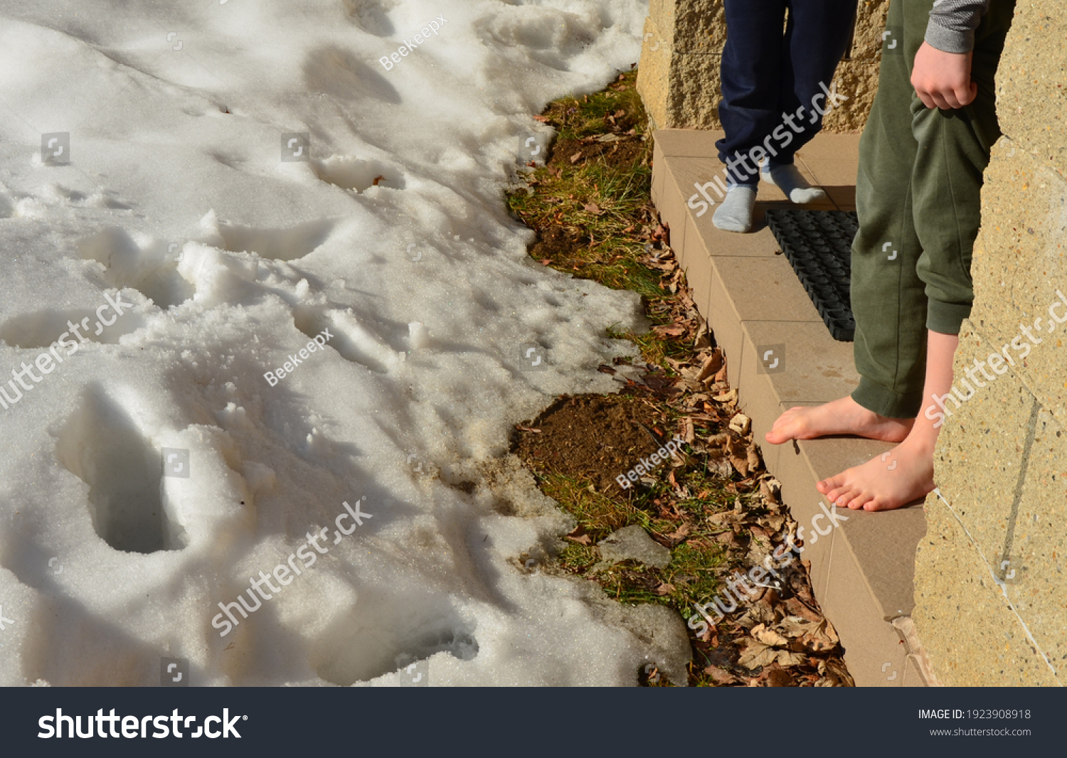 Schoolboy Boy Walks Barefoot Through Snow Stock Photo Edit Now 1923908918