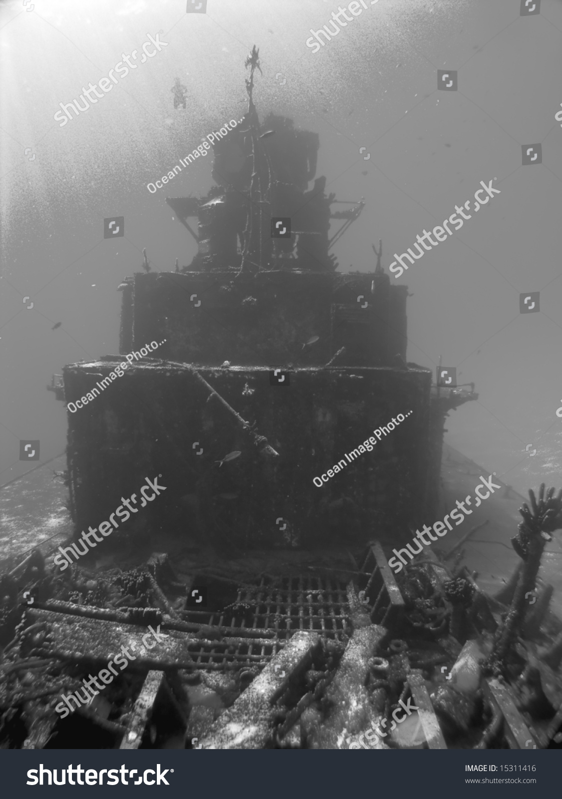 Scuba Diver Descends On A Sunken Ship In Black And White Stock Photo ...