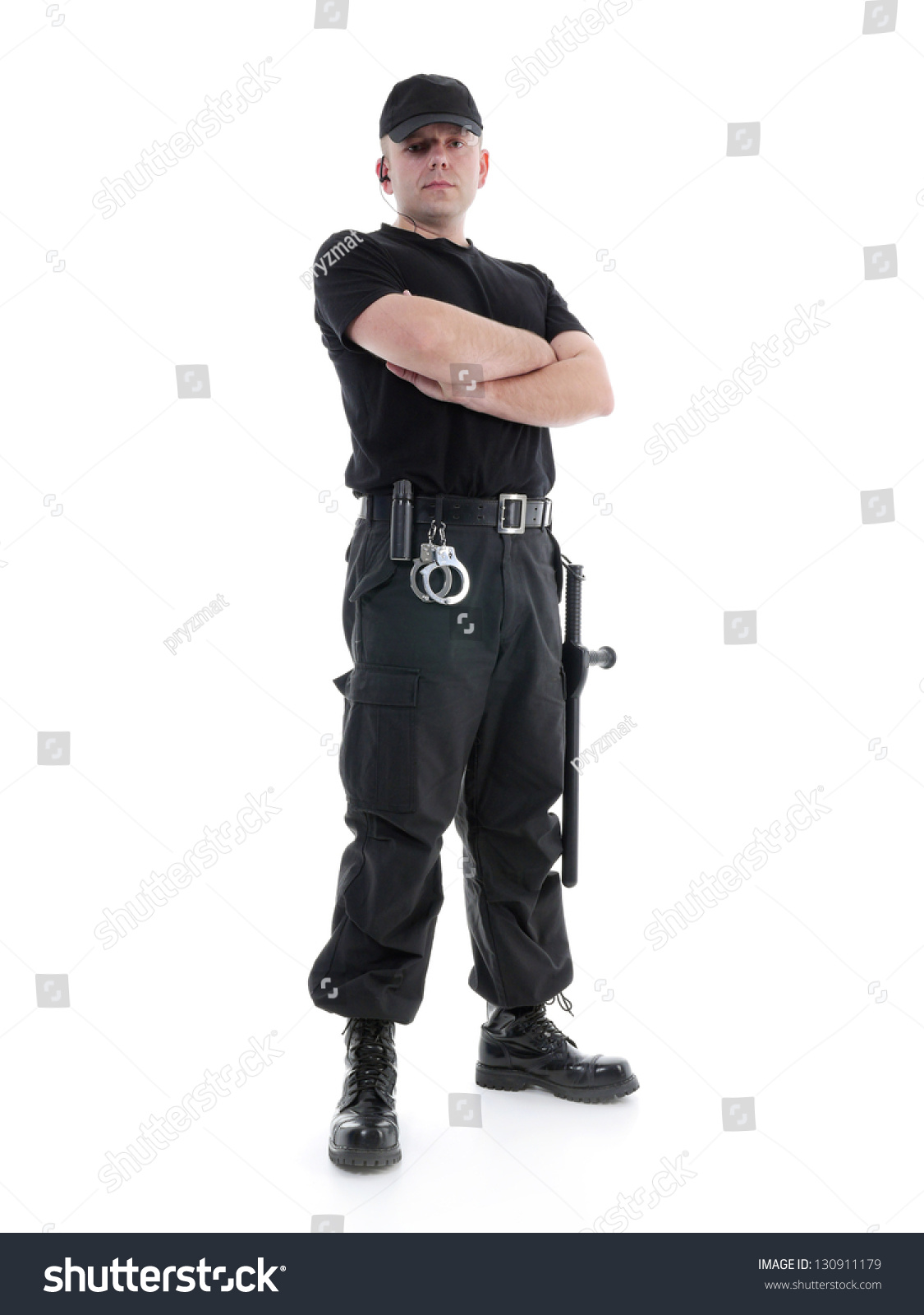 Security Man Wearing Black Uniform Equipped With Police Club And ...