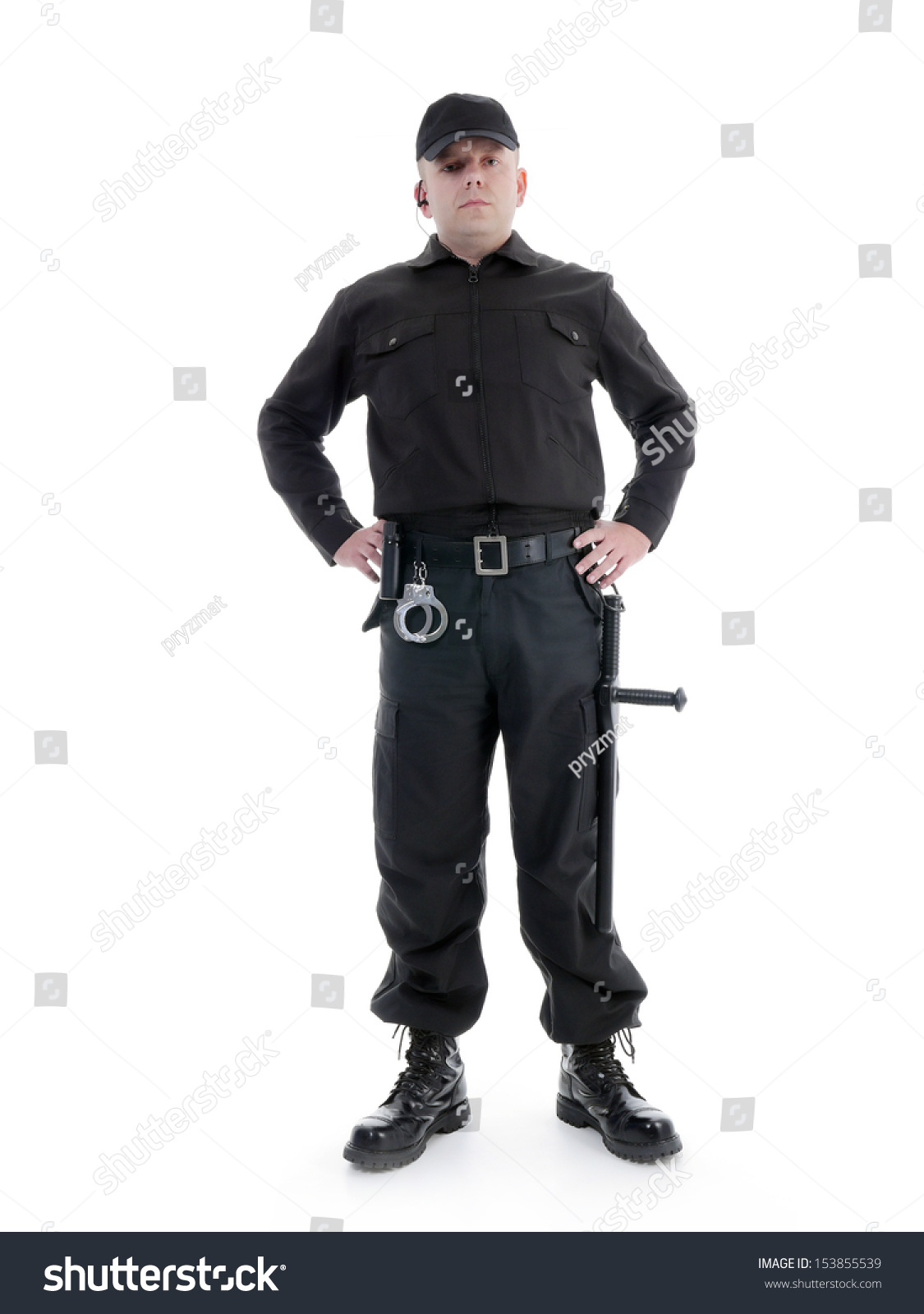 Security Man Wearing Black Uniform Equipped With Police Club And ...