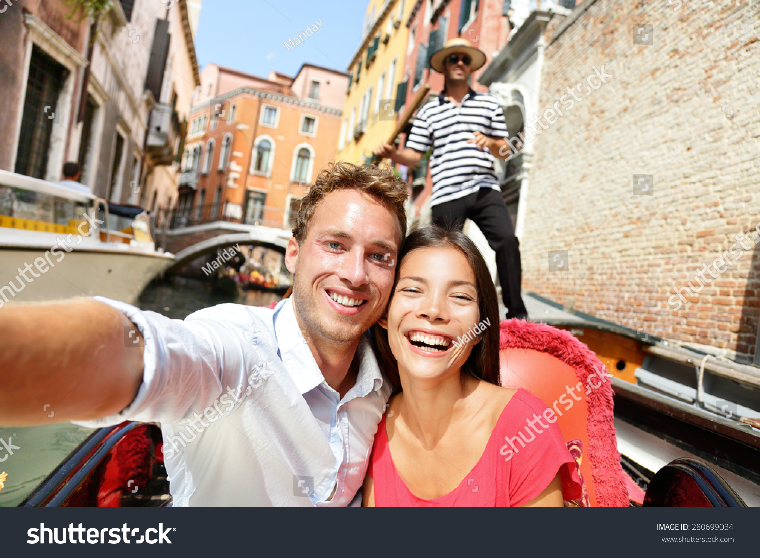 stock photo selfie couple taking picture in gondola on venice travel vacation beautiful lovers on a romantic