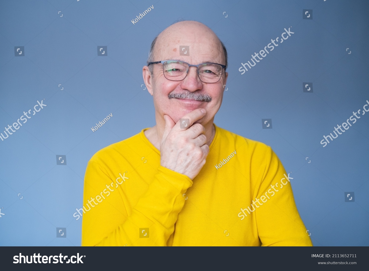 senior-bald-man-glasses-thinking-trying-stock-photo-2113652711