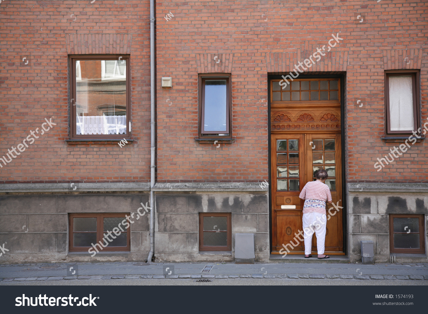 Apartment Building Front Door senior cleaning front door old weathered stock photo 1574193 Apartment Building Front Door senior cleaning front door old weathered stock photo 1574193