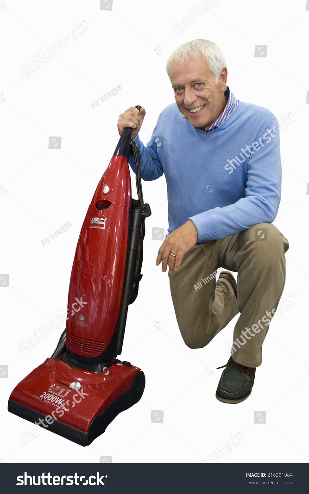 stock-photo-senior-man-holding-vacuum-cleaner-on-one-knee-cut-out-216391084.jpg