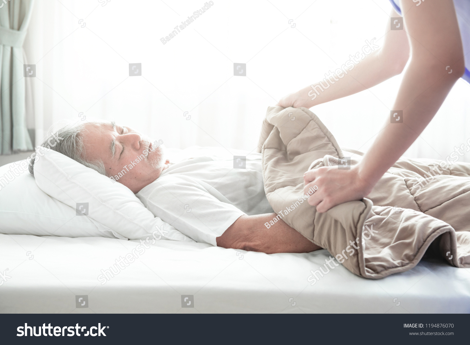 Senior Man Sleeping Bed Nurse Put Stock Photo Edit Now 1194876070