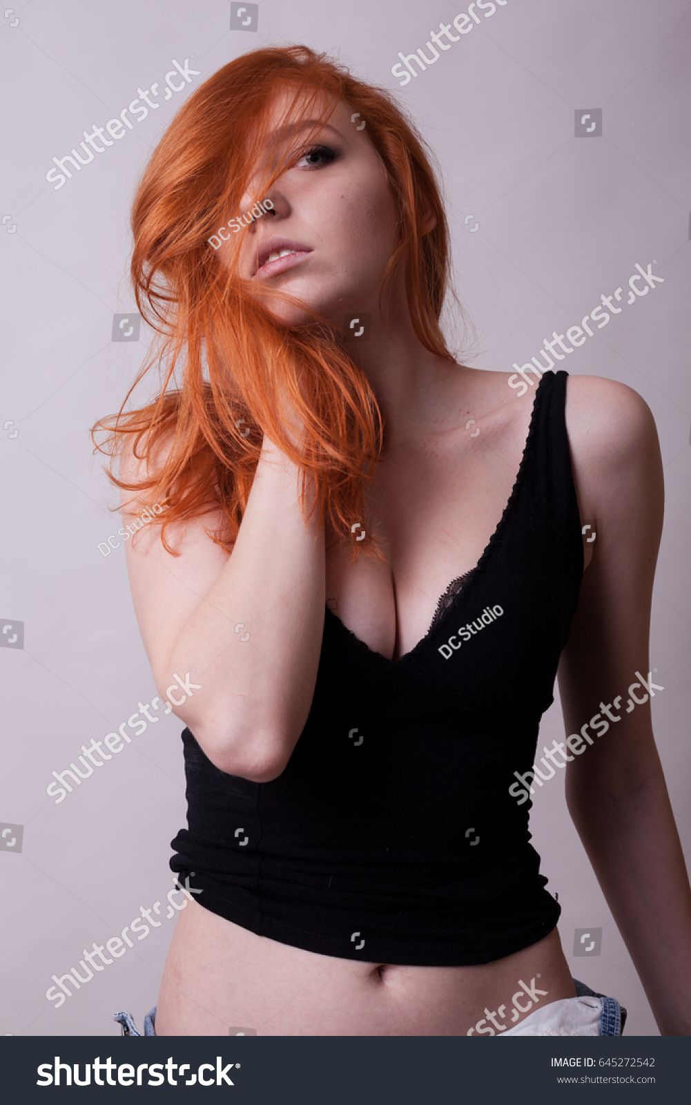 Busty red head