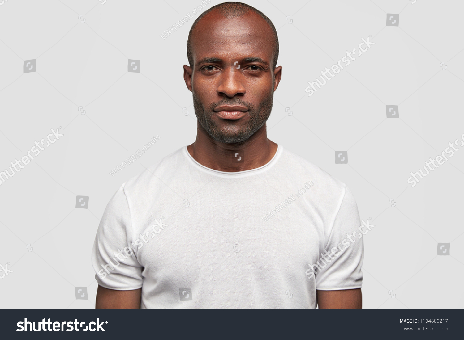 Serious Dark Skinned Young Male Looks Foto Stock 1104889217 Shutterstock