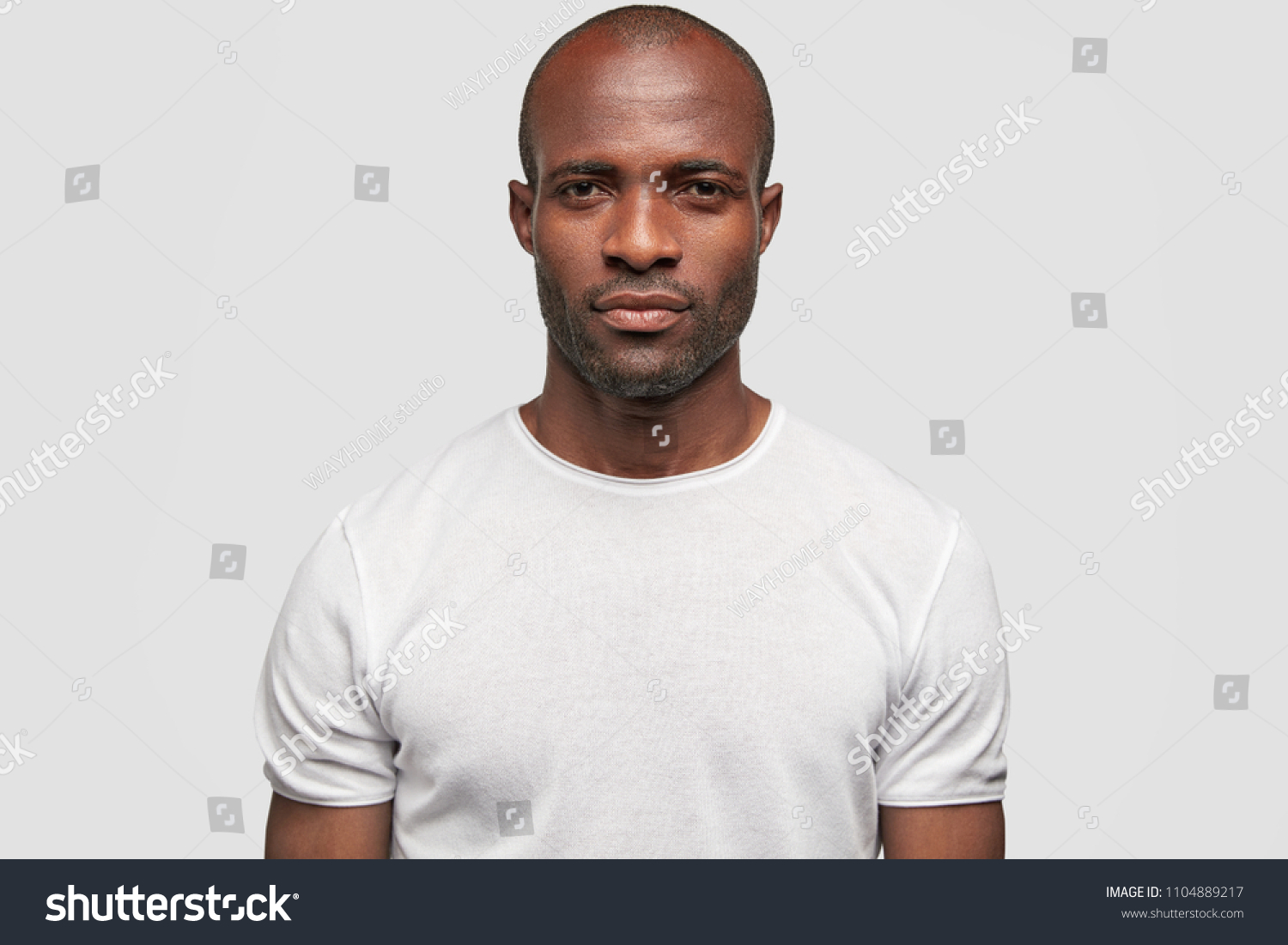 Serious Dark Skinned Young Male Looks Foto Stock 1104889217 Shutterstock 4233