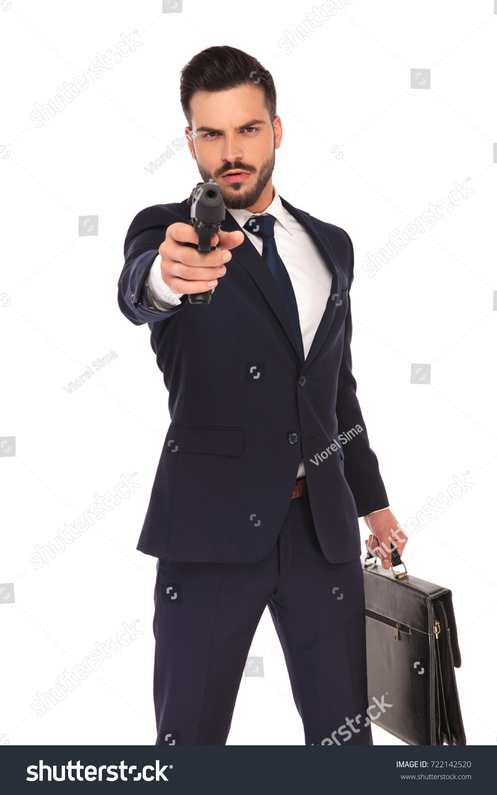 Serious Young Hitman Pointing Aiming His Stock Photo (Edit Now) 722142520