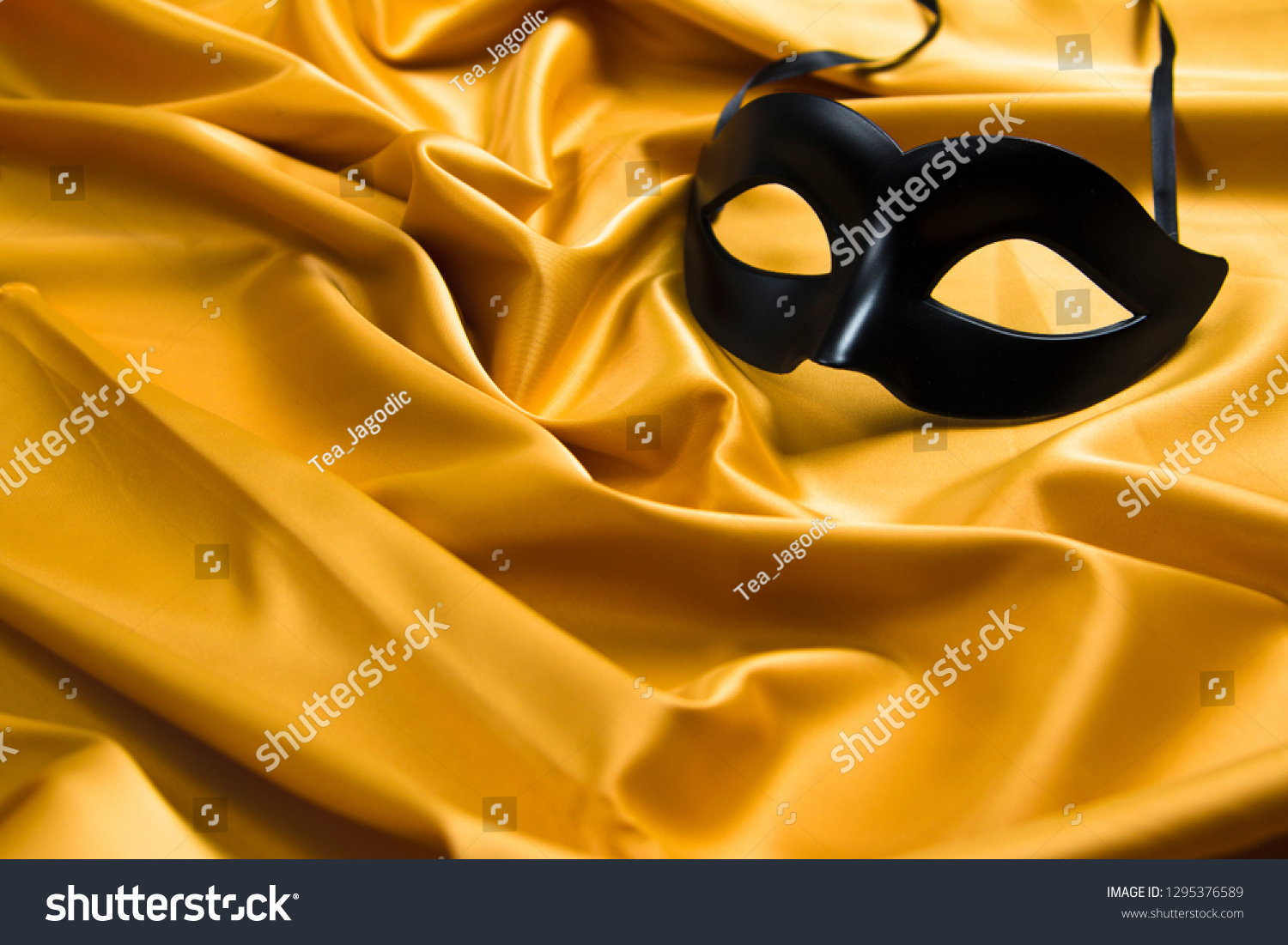 Download Sexy Black Mask On Yellow Silky Stock Photo Edit Now 1295376589 PSD Mockup Templates