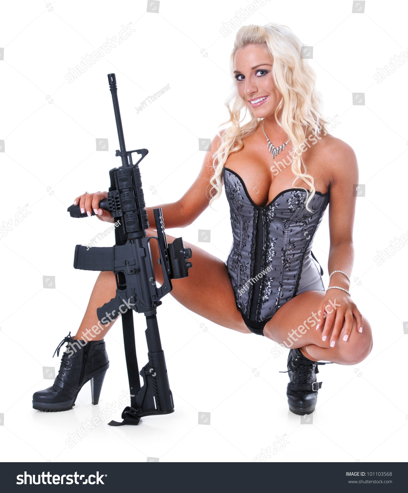 [Image: stock-photo-sexy-blonde-girl-holding-a-g...103568.jpg]