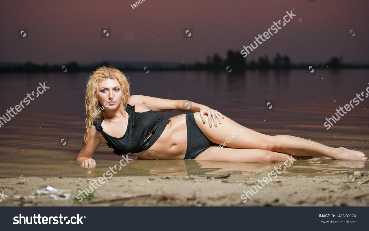 Sexy Blonde Woman Water Sunset Beautiful Stock Photo