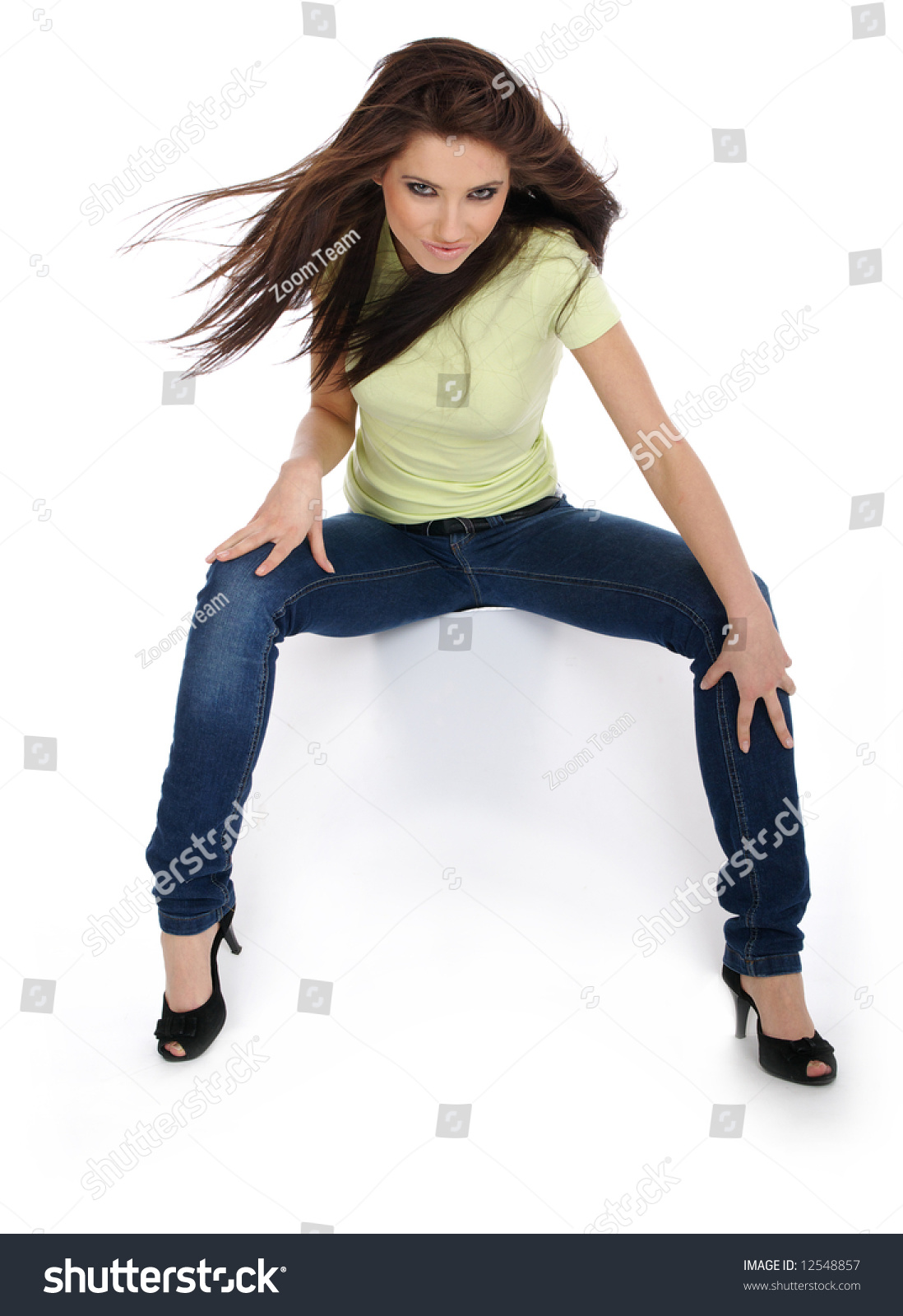 Sexy Girl Jeans Sitting On White Stock Photo 12548857 - Shutterstock