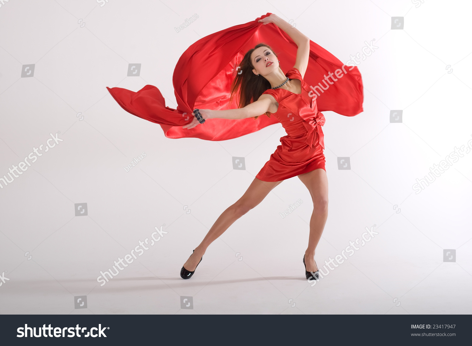Sexy Lady In Red Dress In Studio Is Dancing Stock Photo 23417947 ...