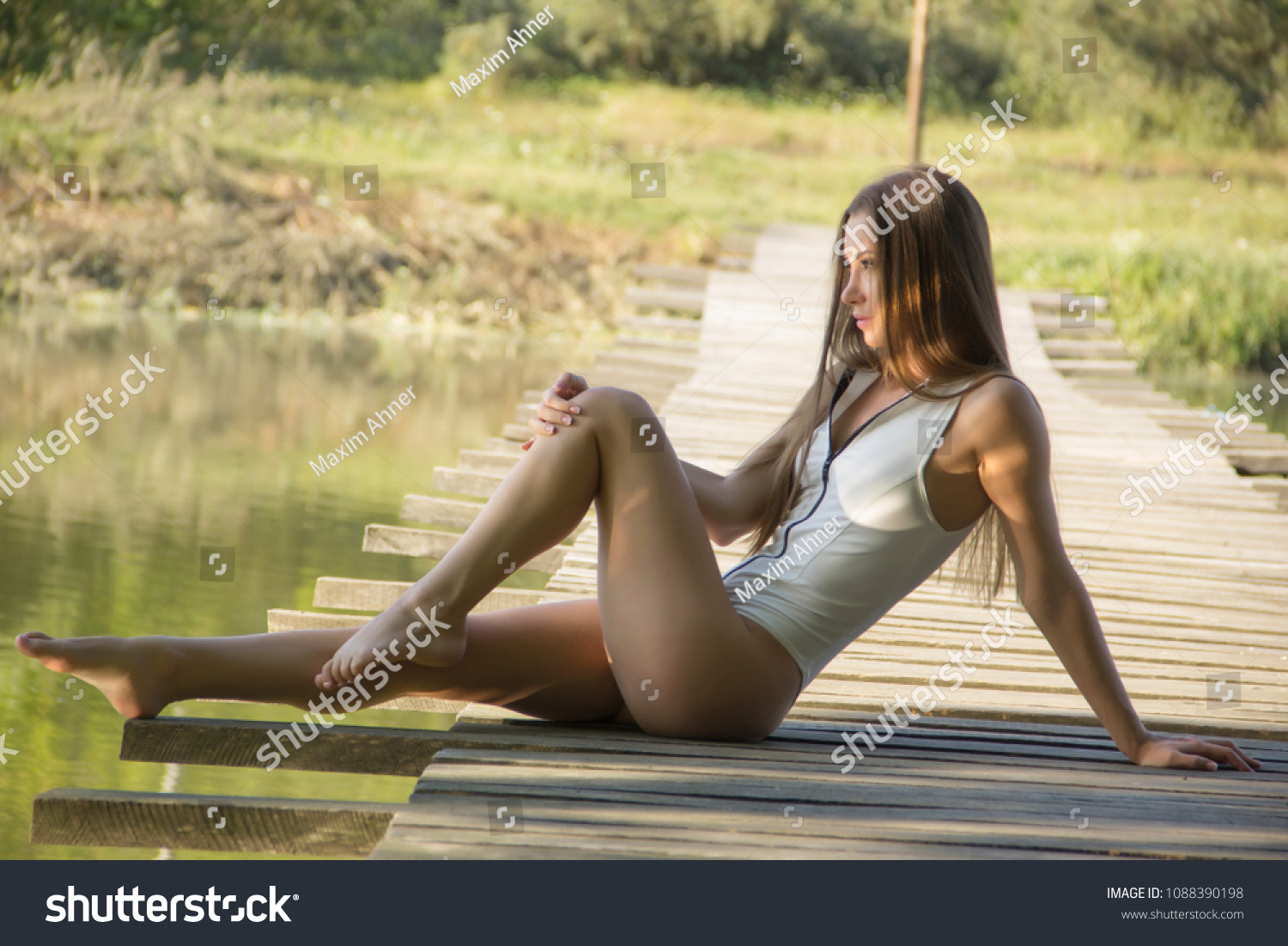 Skinny Sexy Chick Gives Attractive Pose Outdoor