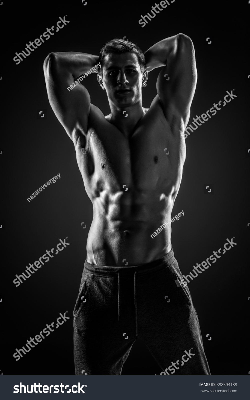 Sexy Shirtless Bodybuilder Posing Looking Camera Stock Photo 388394188 ...