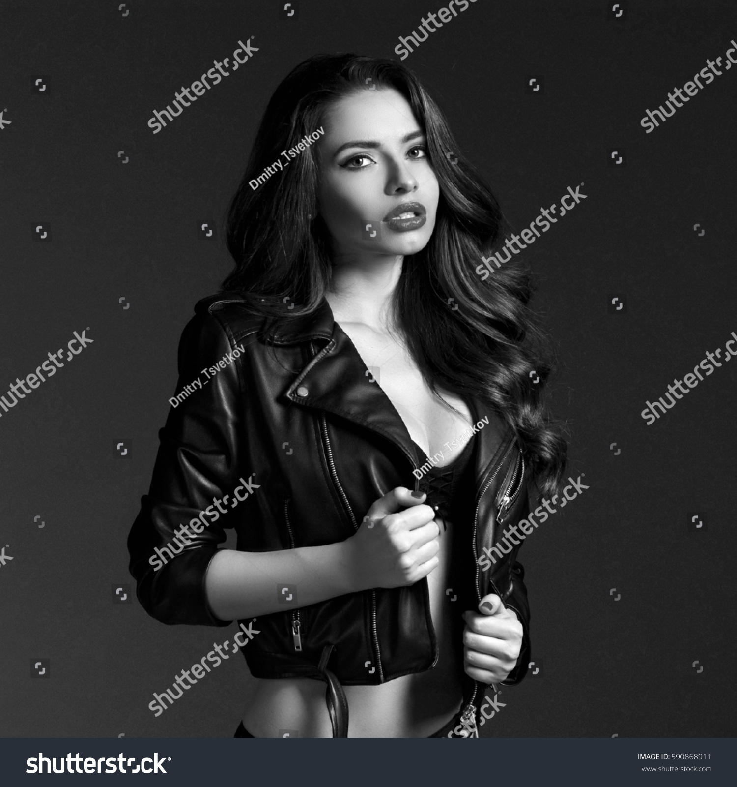Black and white woman in trenchcoat erotic photo