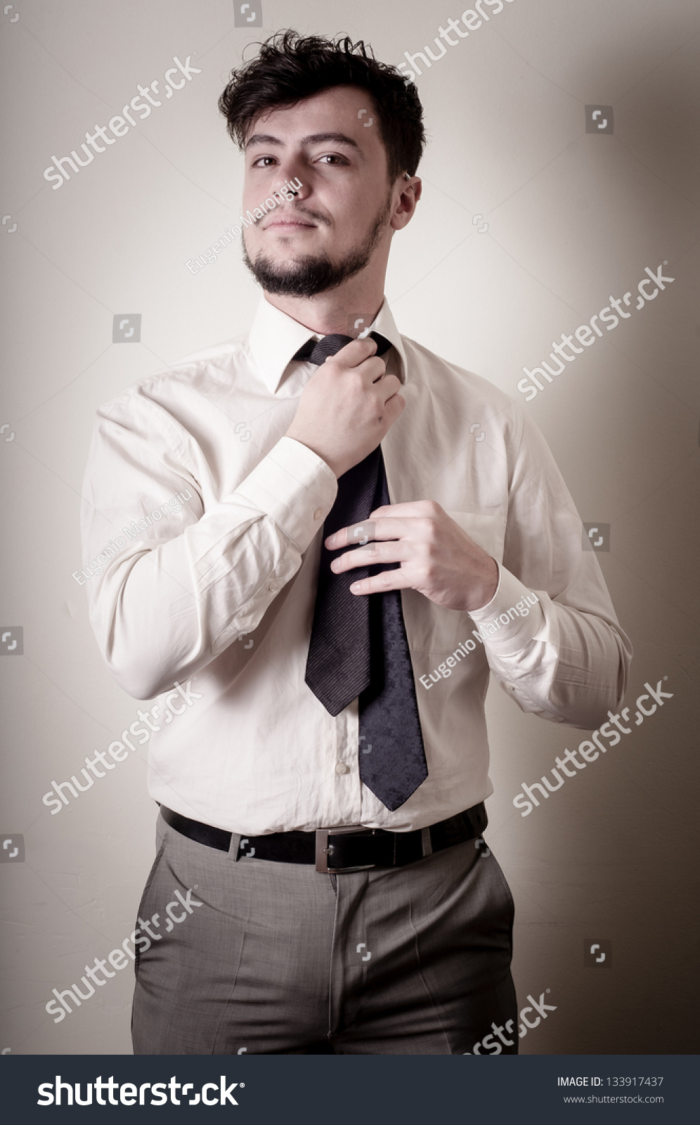 Sexy Stylish Businessman Adjusting Tie On Foto Stok 133917437 Shutterstock 