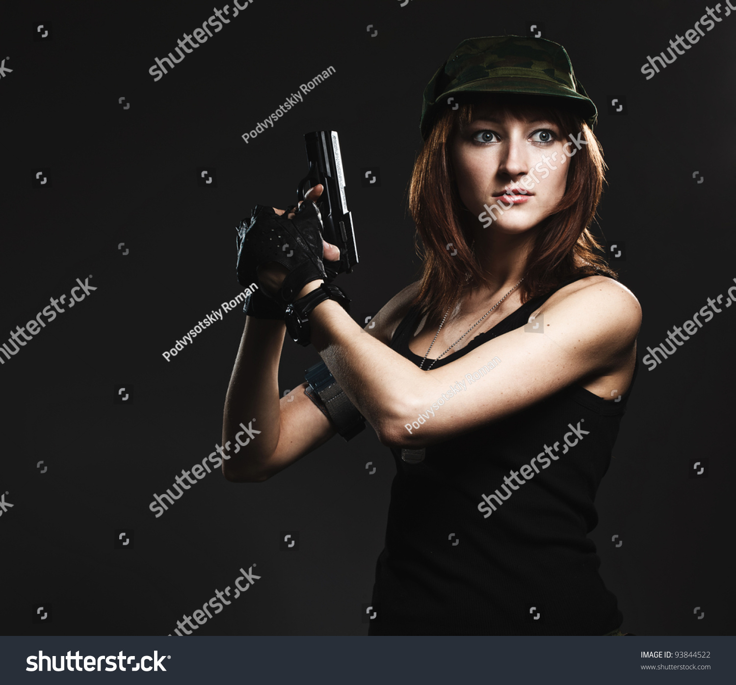 Sexy Woman Holding Gun On Gray Stock Photo 93844522 : Shutterstock