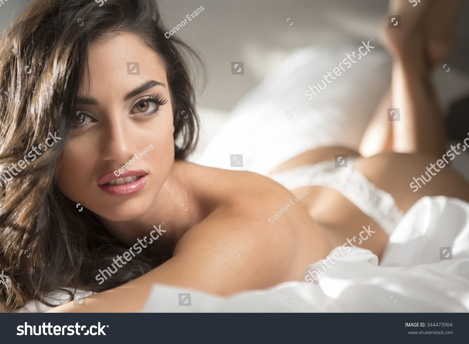 Laying in bed erotic