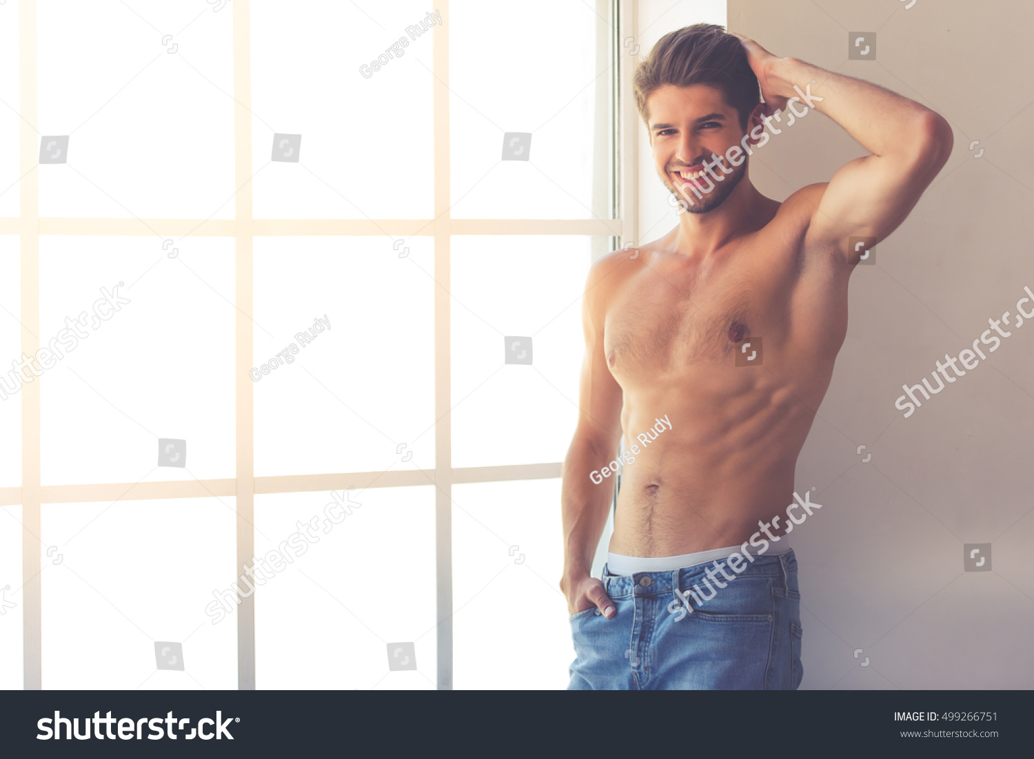 Brawny Bare-Chested Young Man Stock Photo 104465741 