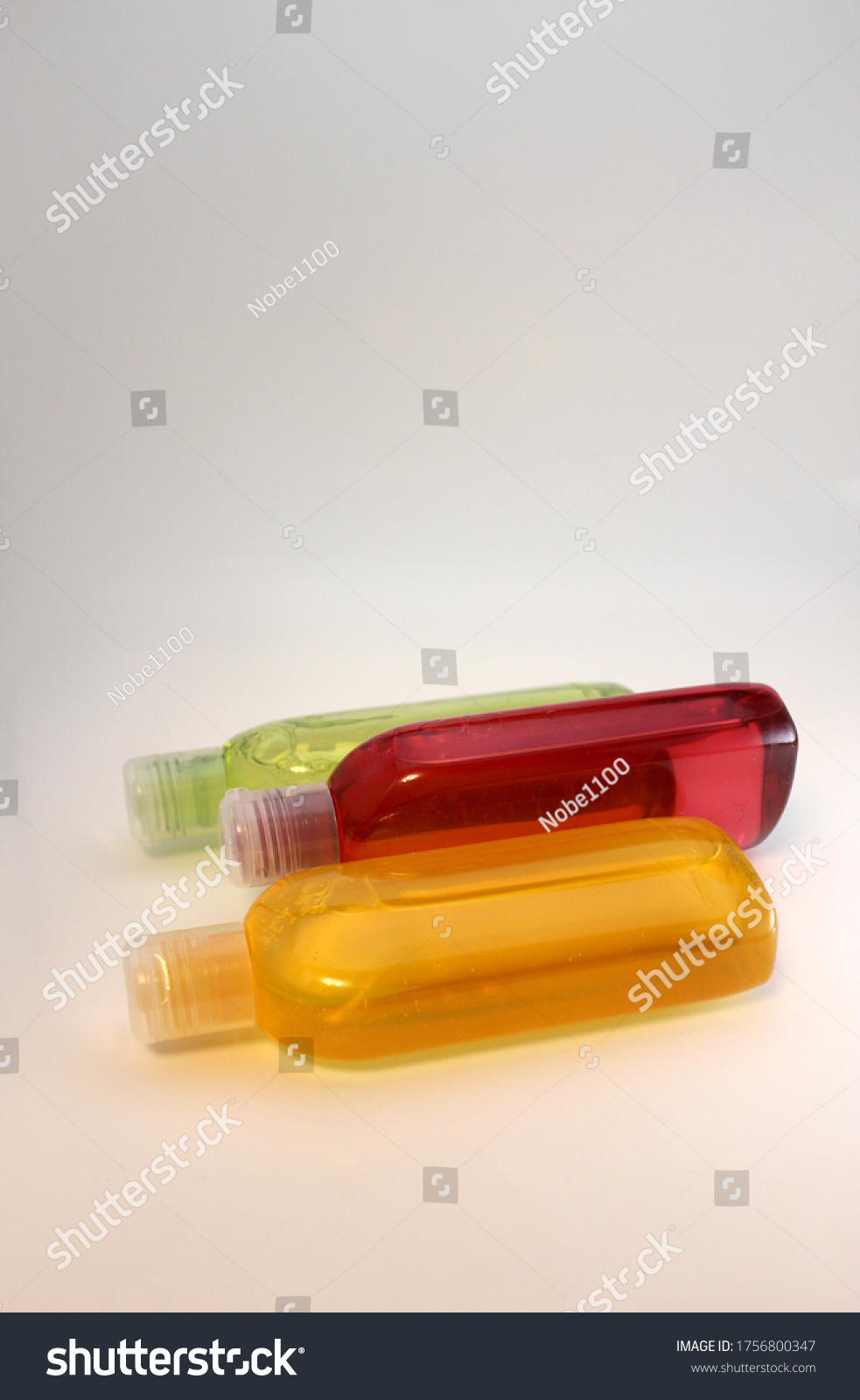 Download Shampoo Bottle Colorful Green Red Yellow Stock Photo Edit Now 1756800347 PSD Mockup Templates
