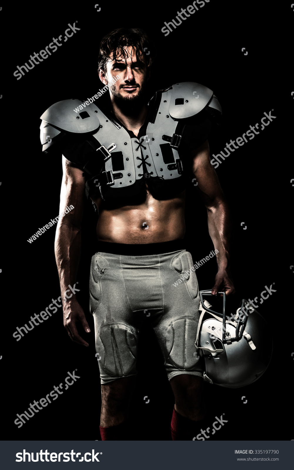 Shirtless American Football Player Padding Holding Stock Photo Edit Now