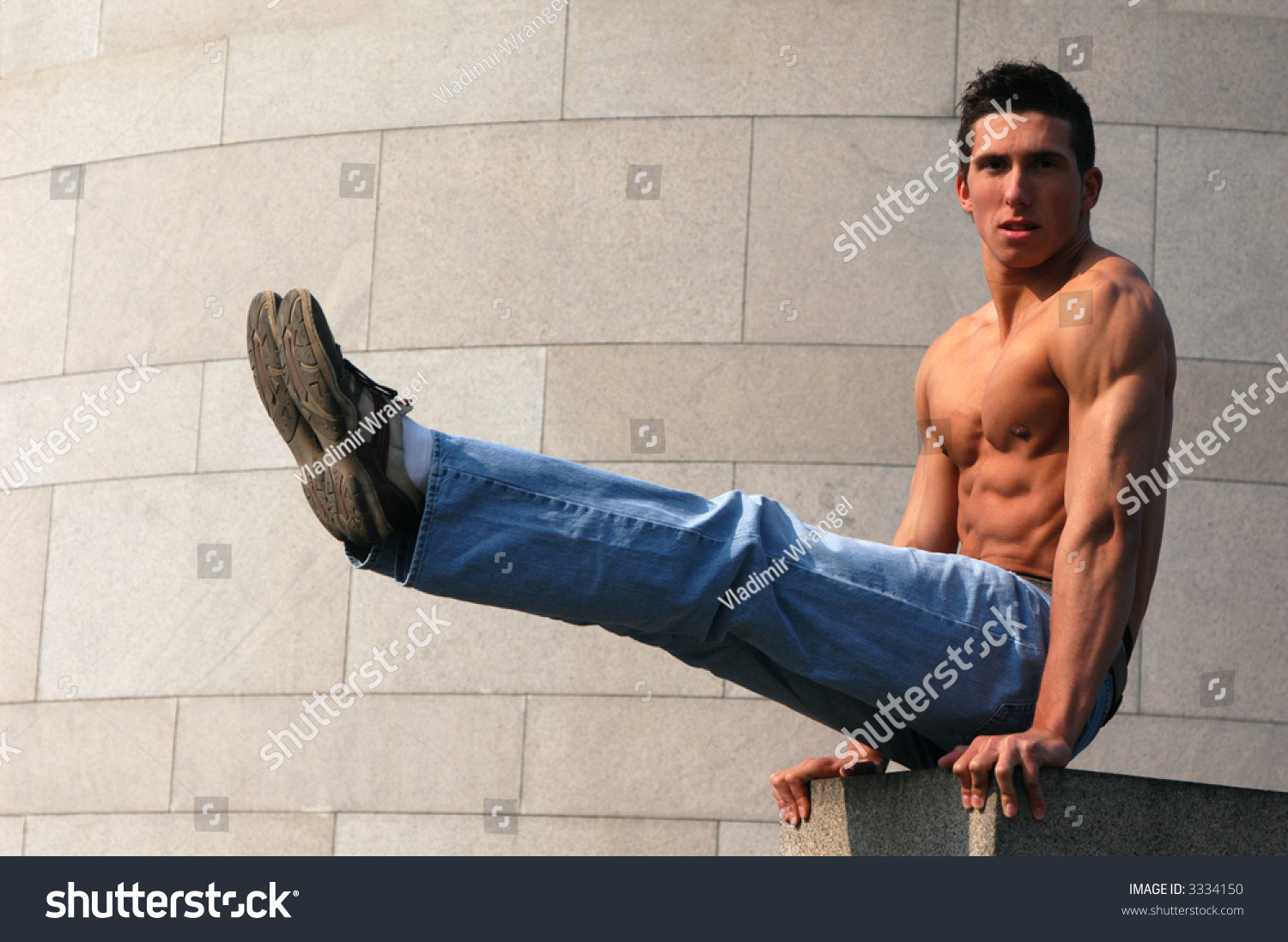 Shirtless Muscular Gymnast Holding His Legs Ahead Stock Photo 3334150 ...