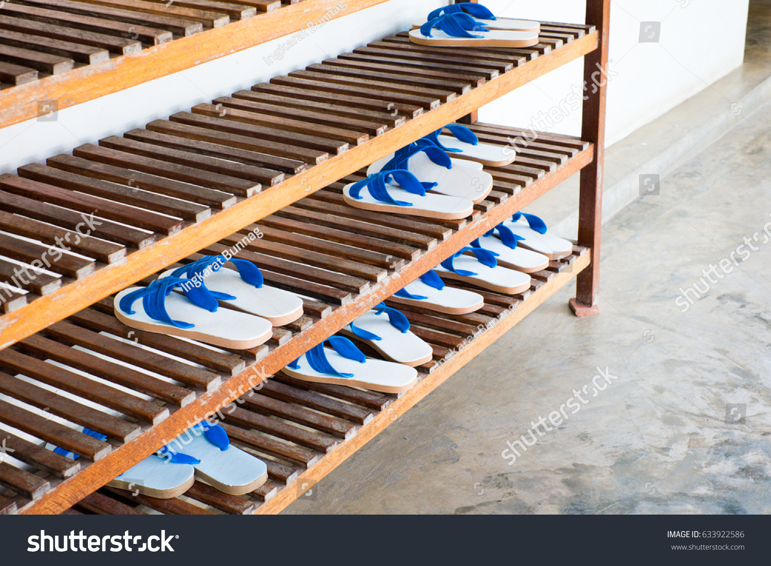 Shoe Rack White Blue Rubber Sandal Stock Photo Edit Now 633922586