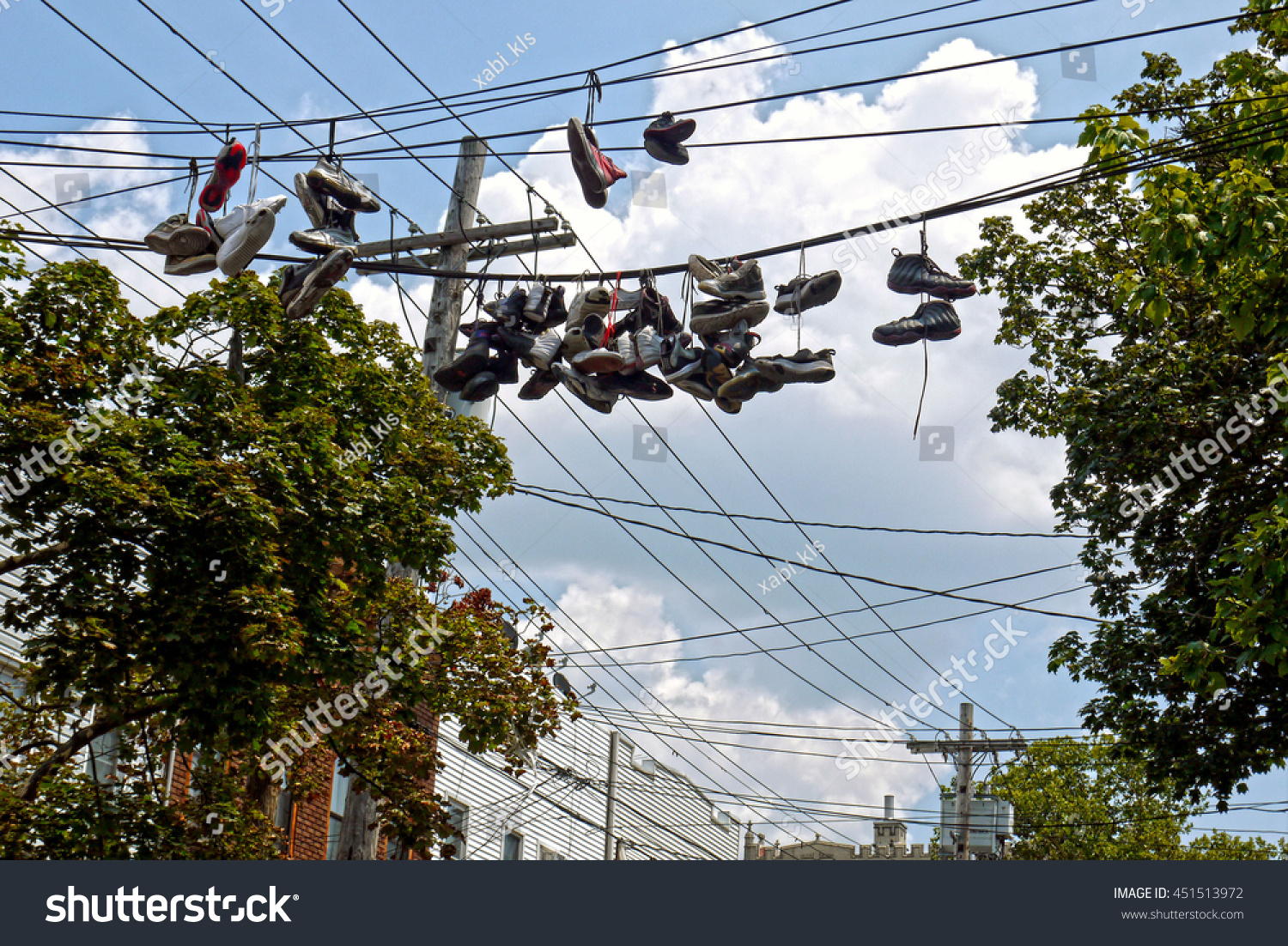 shoes on electric line