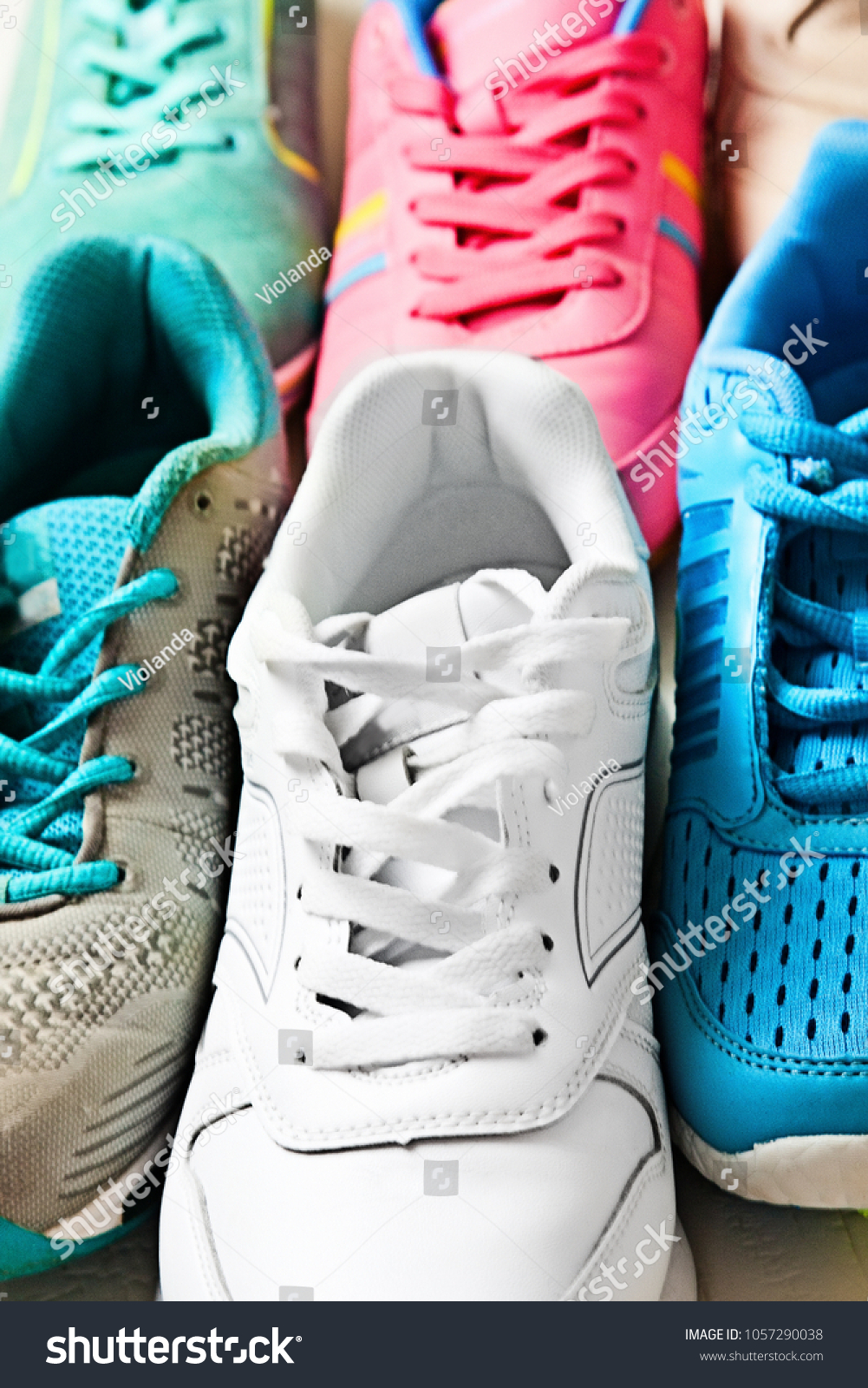 shoes that look both pink and white and blue and gray
