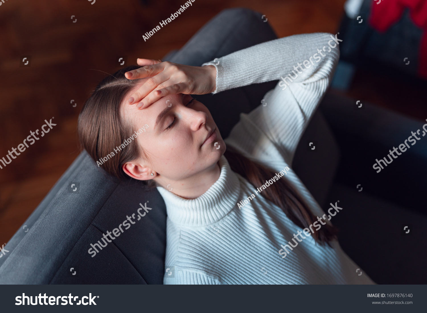 sick-girl-home-headache-feeling-faint-stock-photo-1697876140-shutterstock