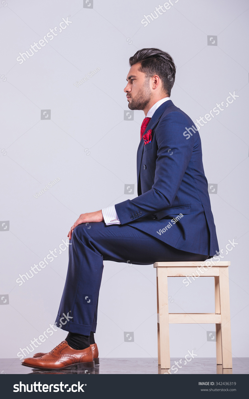 Side Portrait On Man Suit Sitting Stock Photo 342436319 - Shutterstock