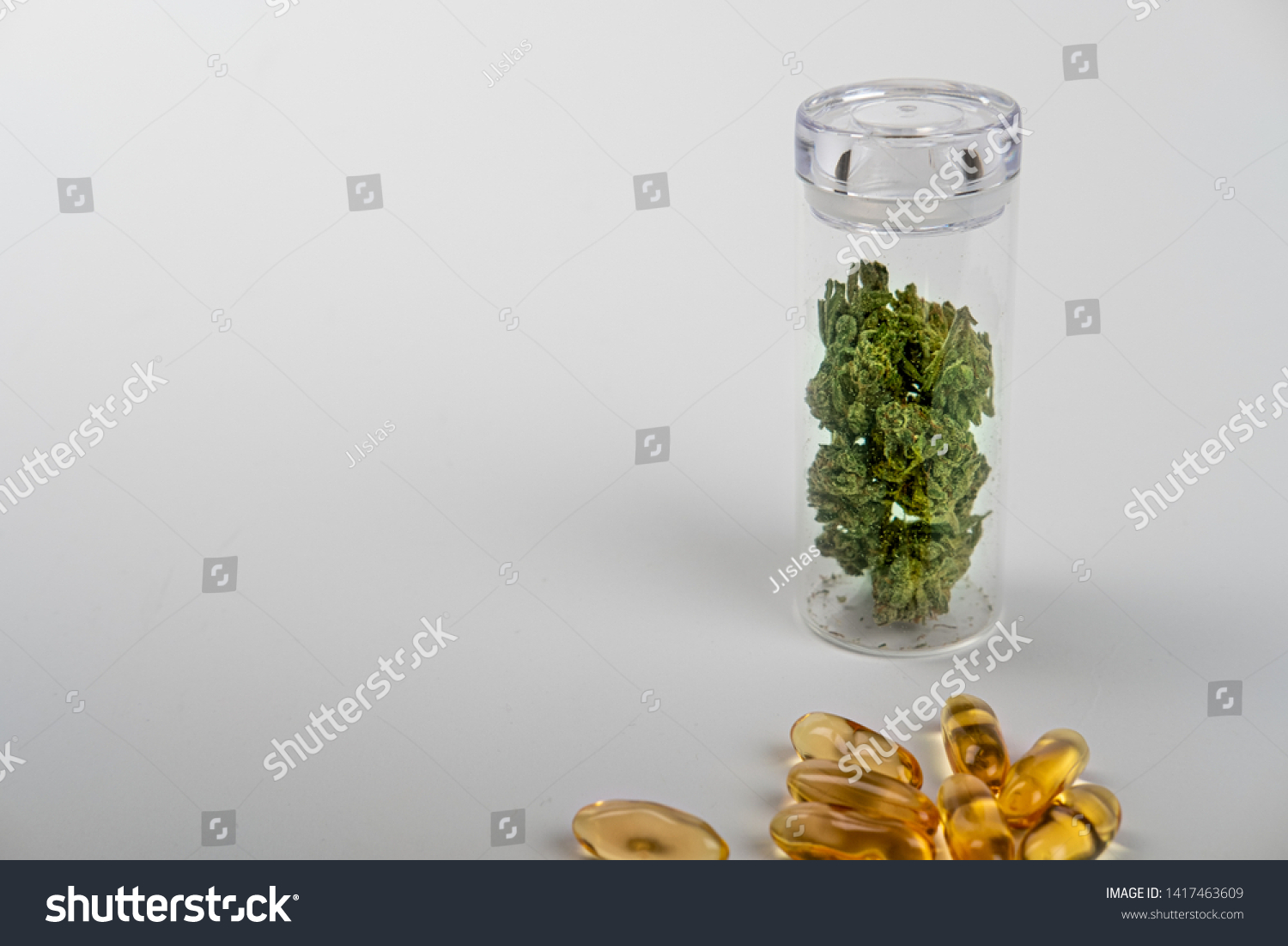 Download Side View Glass Jar Marijuana Buds Stock Image Download Now Yellowimages Mockups