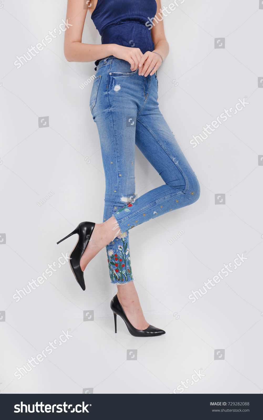 jeans with flowers on the side