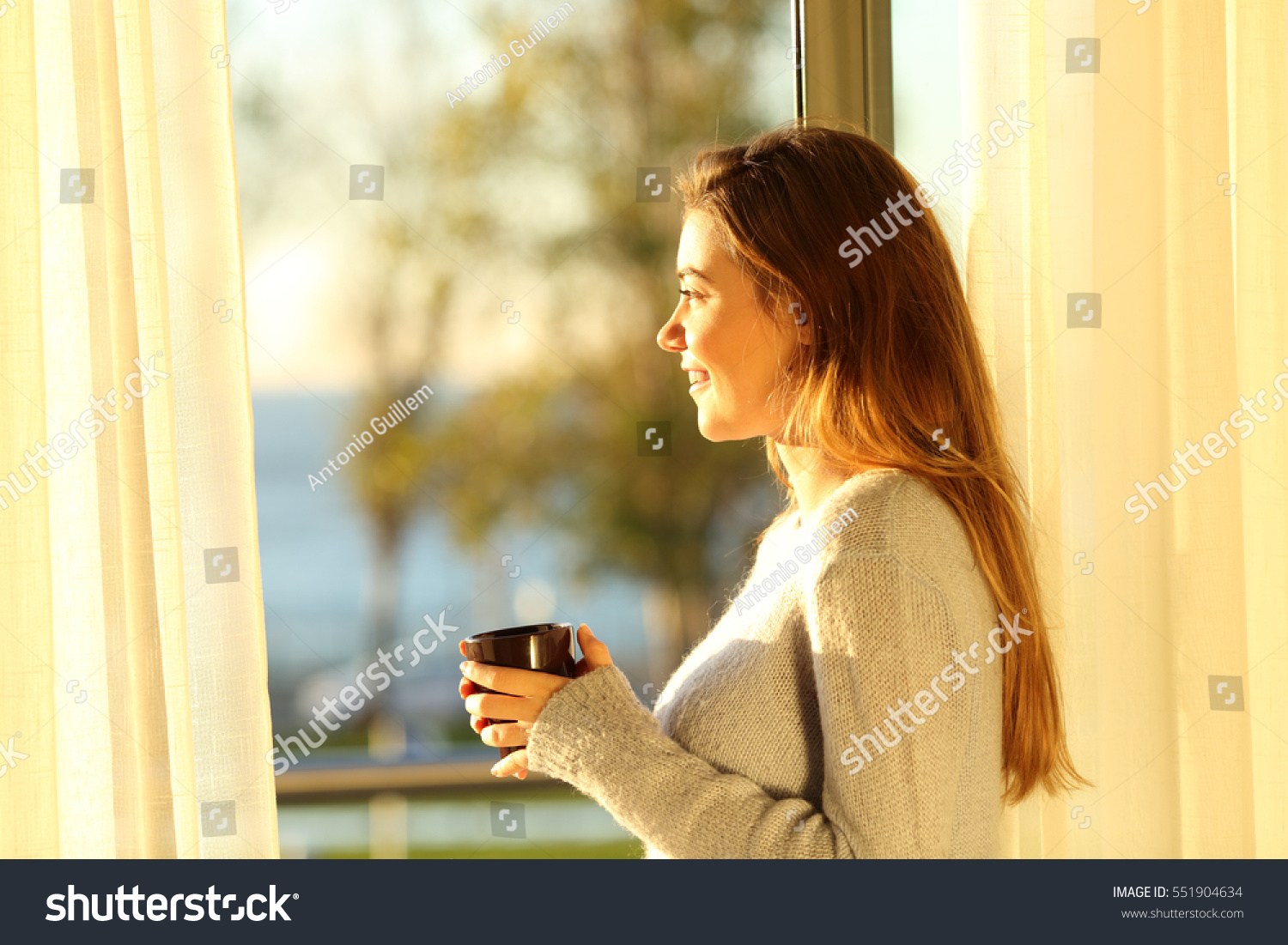 Holding A Single In Portrait Side View Portrait Single Relaxed Stock Photo