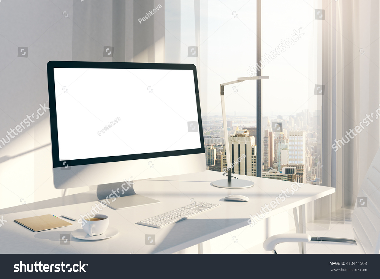 stock photo sideview of creative desktop with blank white computer screen in sunlit office with windows and 410441503