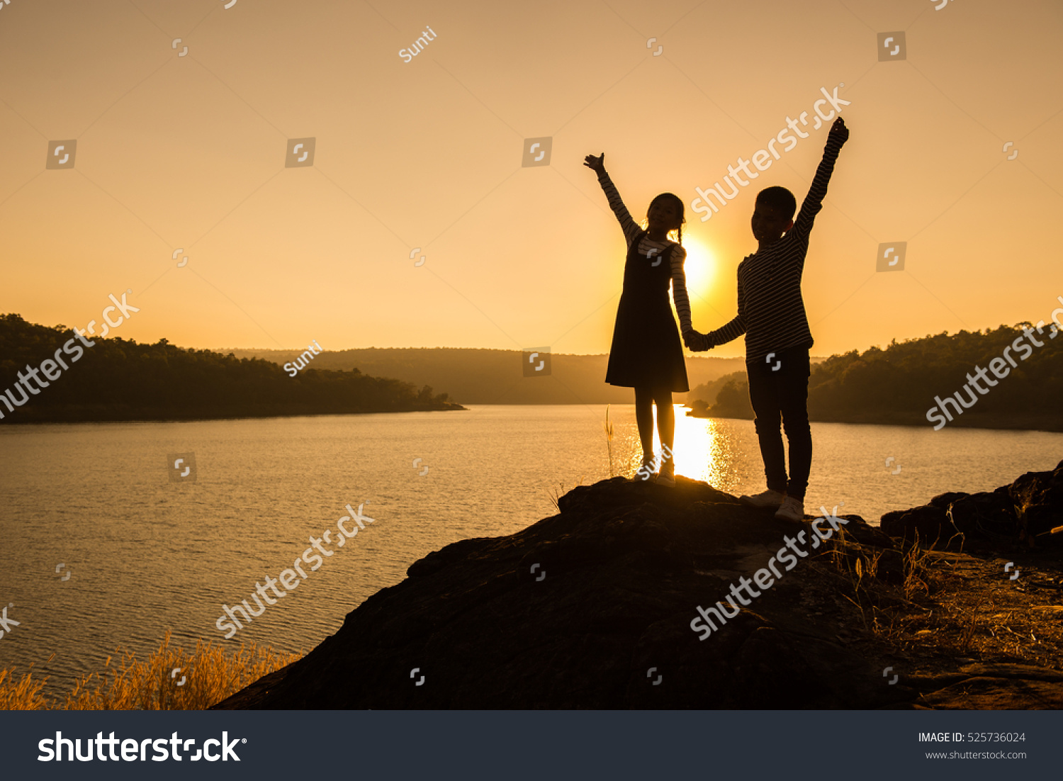 Silhouette Boy Girl Holding Hands On Stock Photo Edit Now