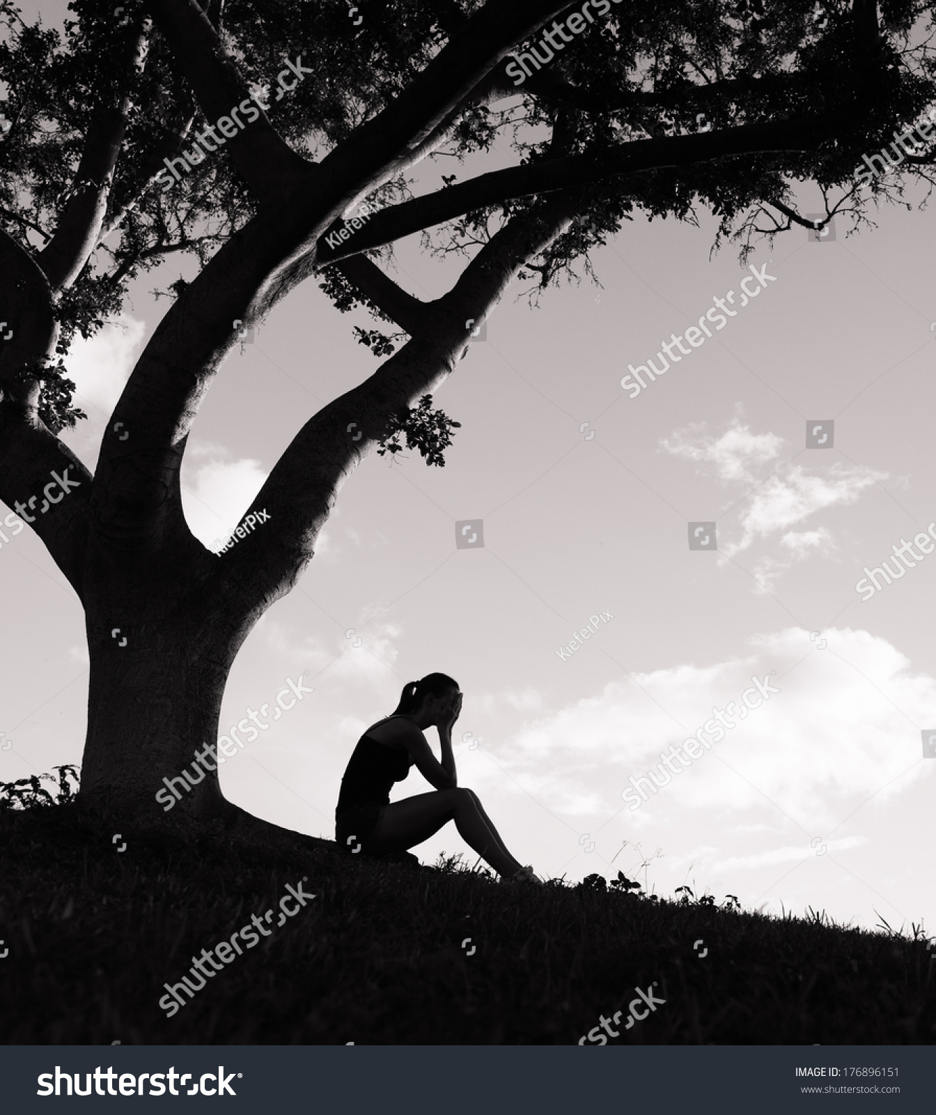 Silhouette Sad Woman Sitting Under Tree Stock Photo 176896151 ...