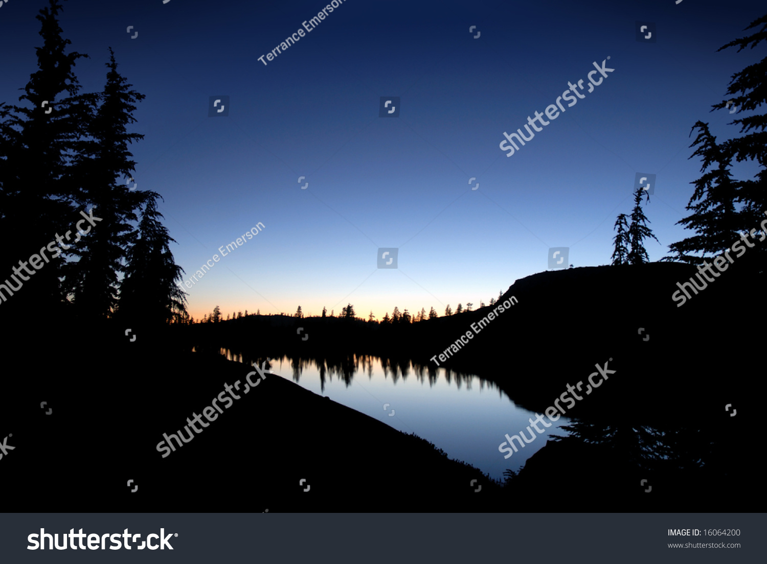 Silhouette Of Sierra Nevada Trees And Granite Dome Reflected In ...