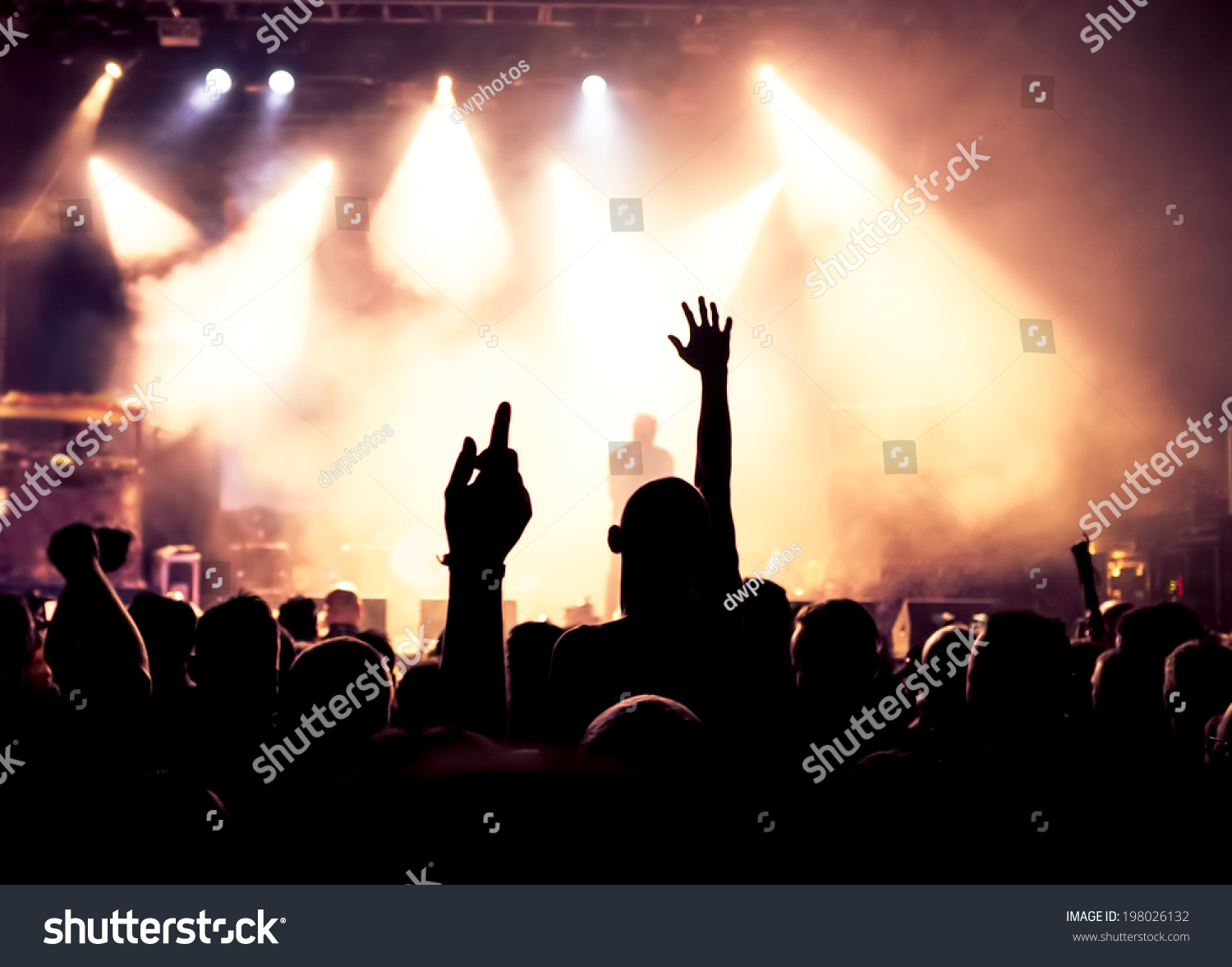 Silhouettes Of Concert Crowd In Front Of Bright Stage Lights Stock ...