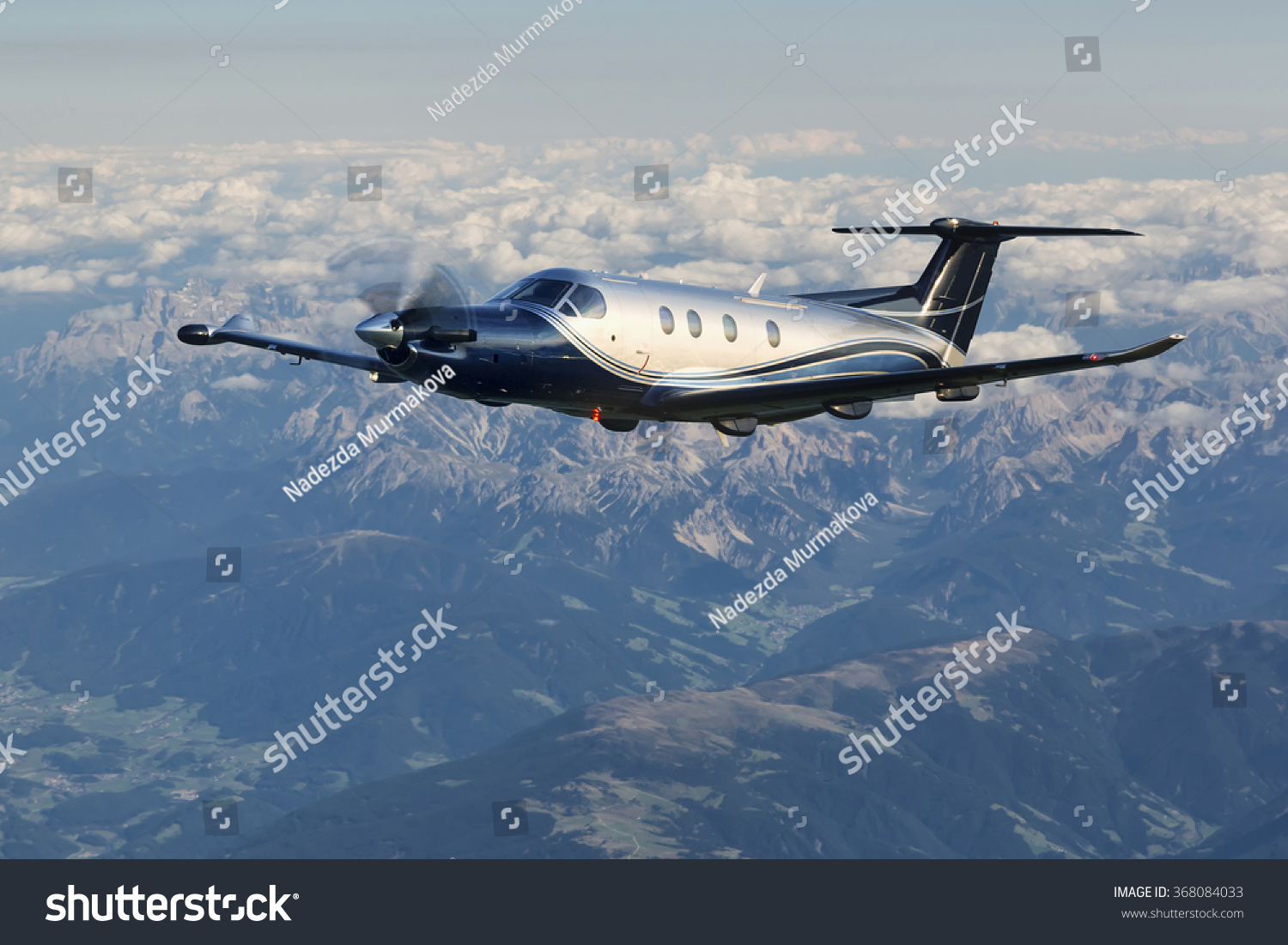 19 113 A 12 Aircraft Images Stock Photos Vectors Shutterstock   Stock Photo Single Engine Turboprop Aircraft Flying Over The Alps In Austria 368084033 