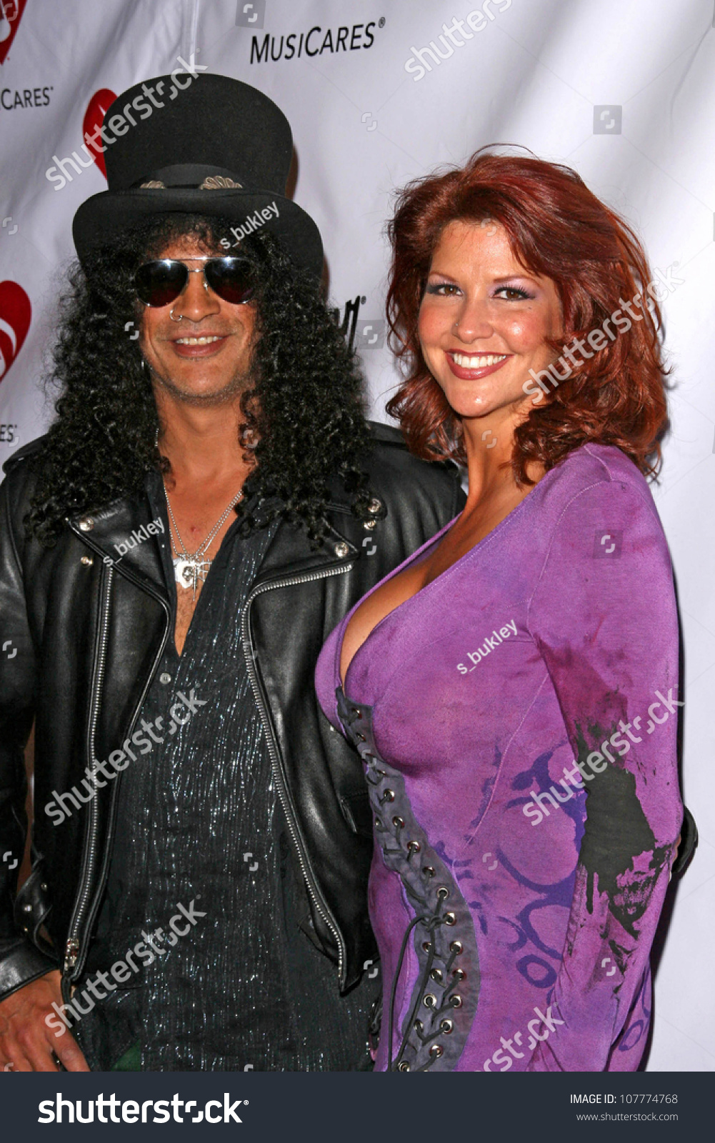 Slash And Wife Perla At The 4th Annual Musicares Map Fund Benefit ...